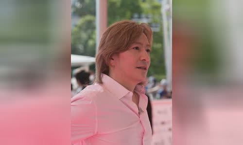 Tetsuya Komuro
