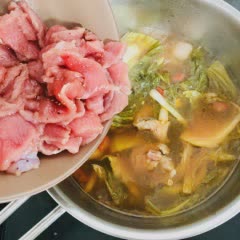 Cách nấu Canh bò cay cải chua
