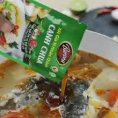 Cách nấu Canh măng chua đầu cá hồi