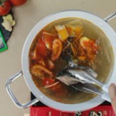 Cách nấu Canh măng chua đầu cá hồi
