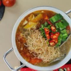 Cách nấu Canh măng chua đầu cá hồi