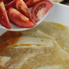 Cách nấu Canh măng chua đầu cá hồi