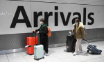 Global firms halt China travel as coronavirus spooks markets
