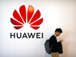 US files more charges against Huawei