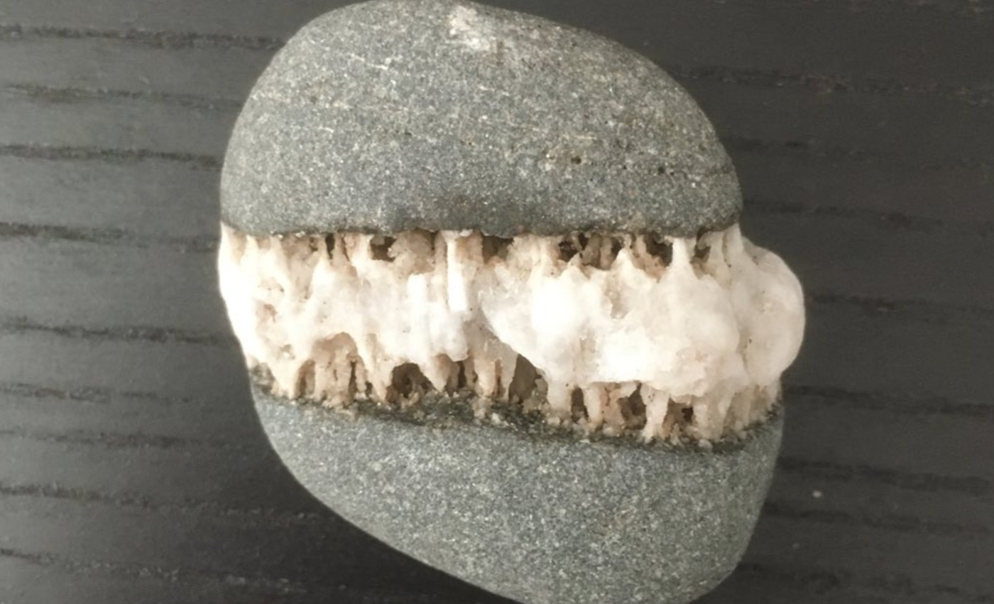 Rock with the teeth-like formation circulating on Twitter could be a dike.