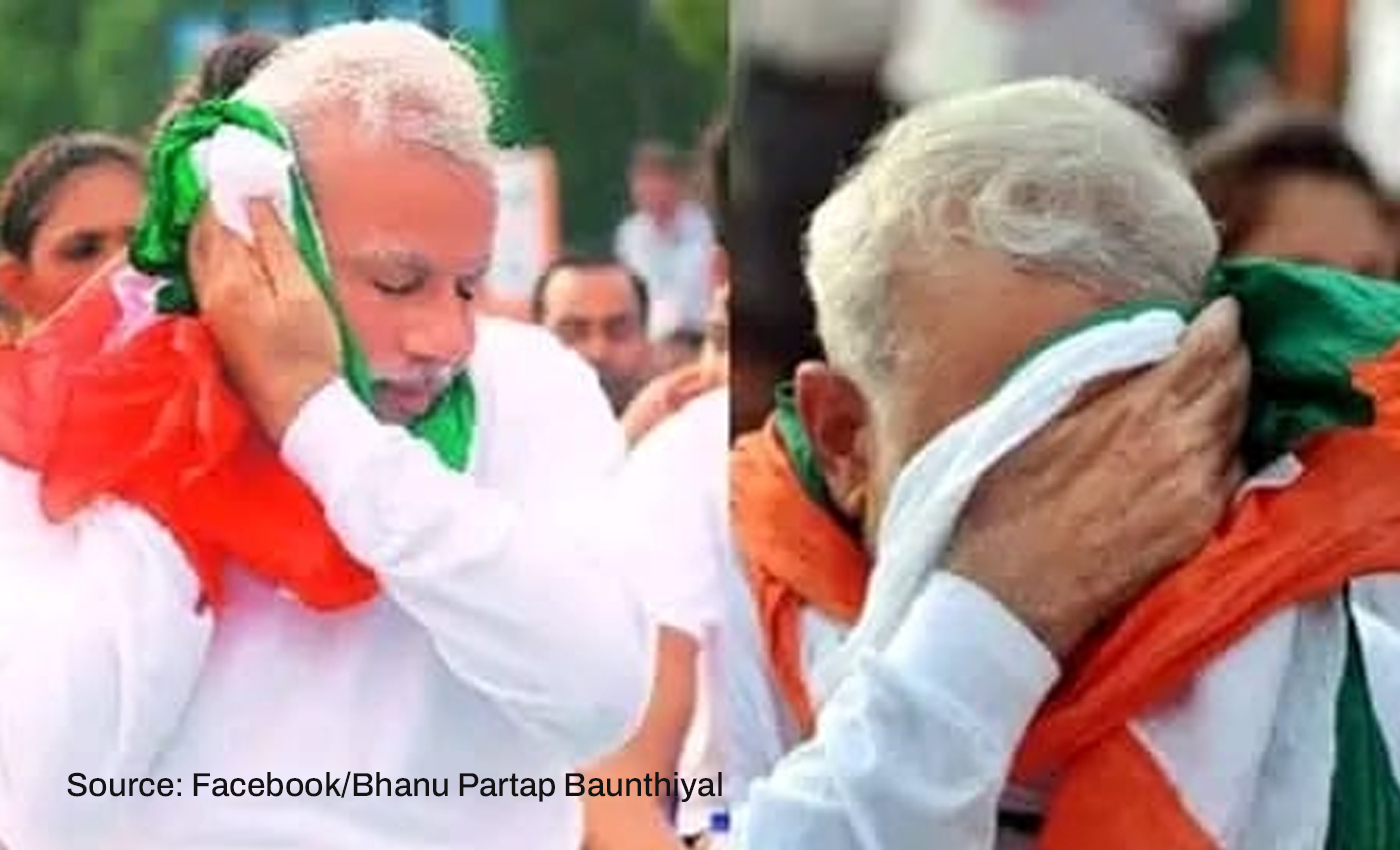 PM Modi insulted the National Flag by wiping the sweat off his face with it.