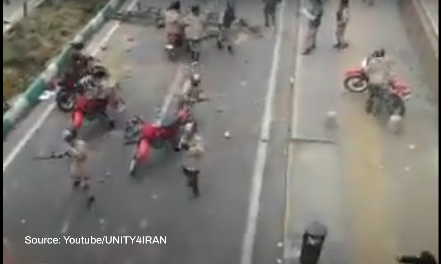 This video shows riot police clashing with protesters in Iran amid demonstrations over Mahsa Amini's death.