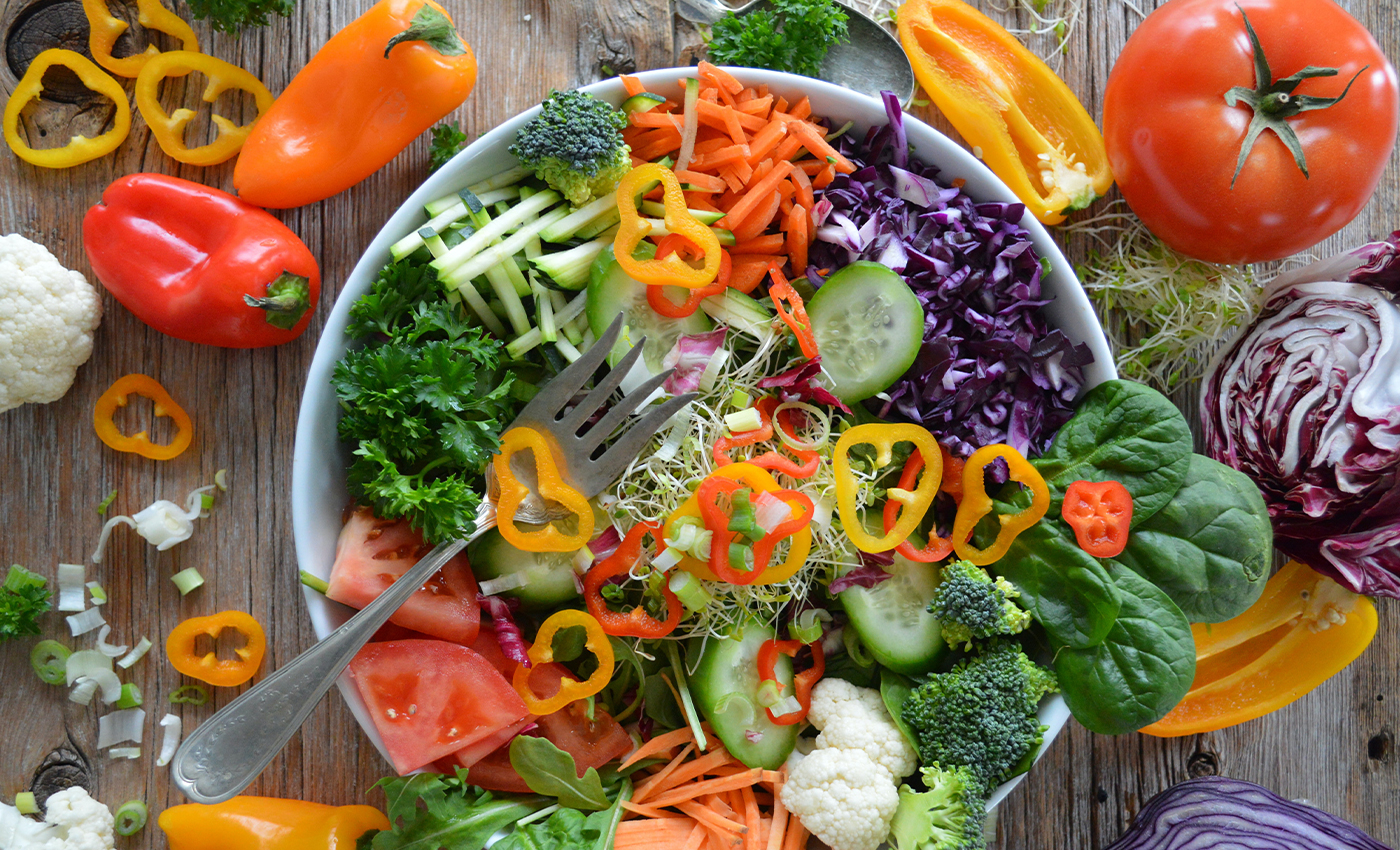 Being vegetarian cuts your food-related carbon footprint in half.