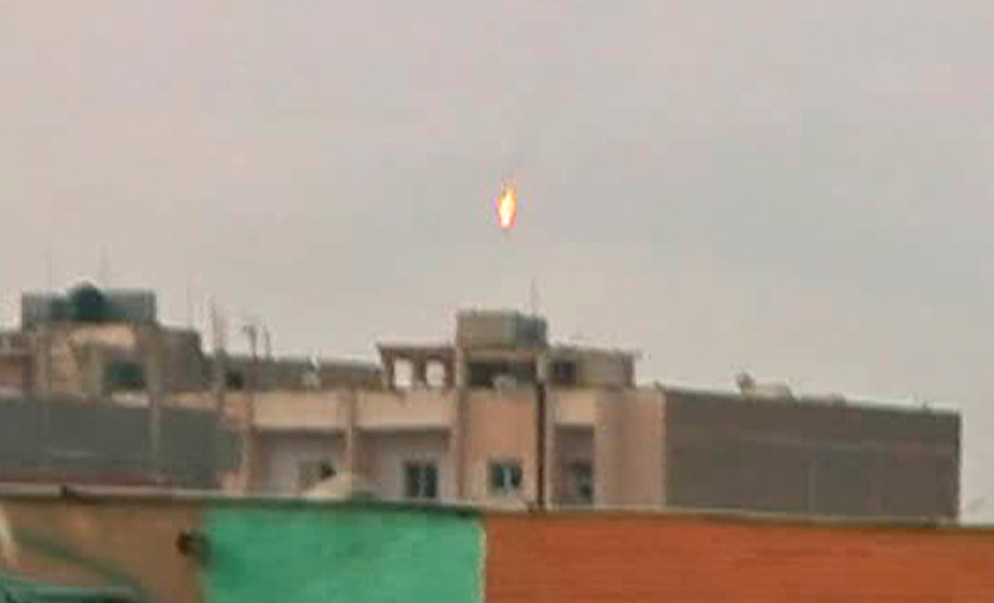 This image from a video clip shows a Russian fighter jet shot down in Ukraine.