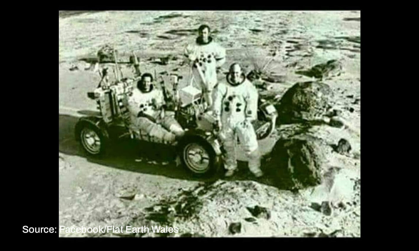 Astronauts on the Moon removed their helmets to pose for a photograph.