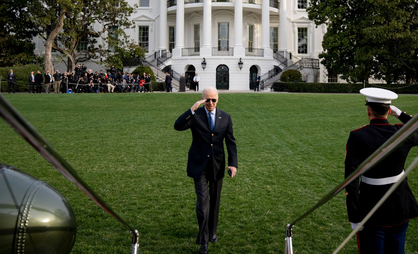 This image of Biden leaving for Europe is fake, as the trees in the background would not have been in full foliage on the day it was taken.
