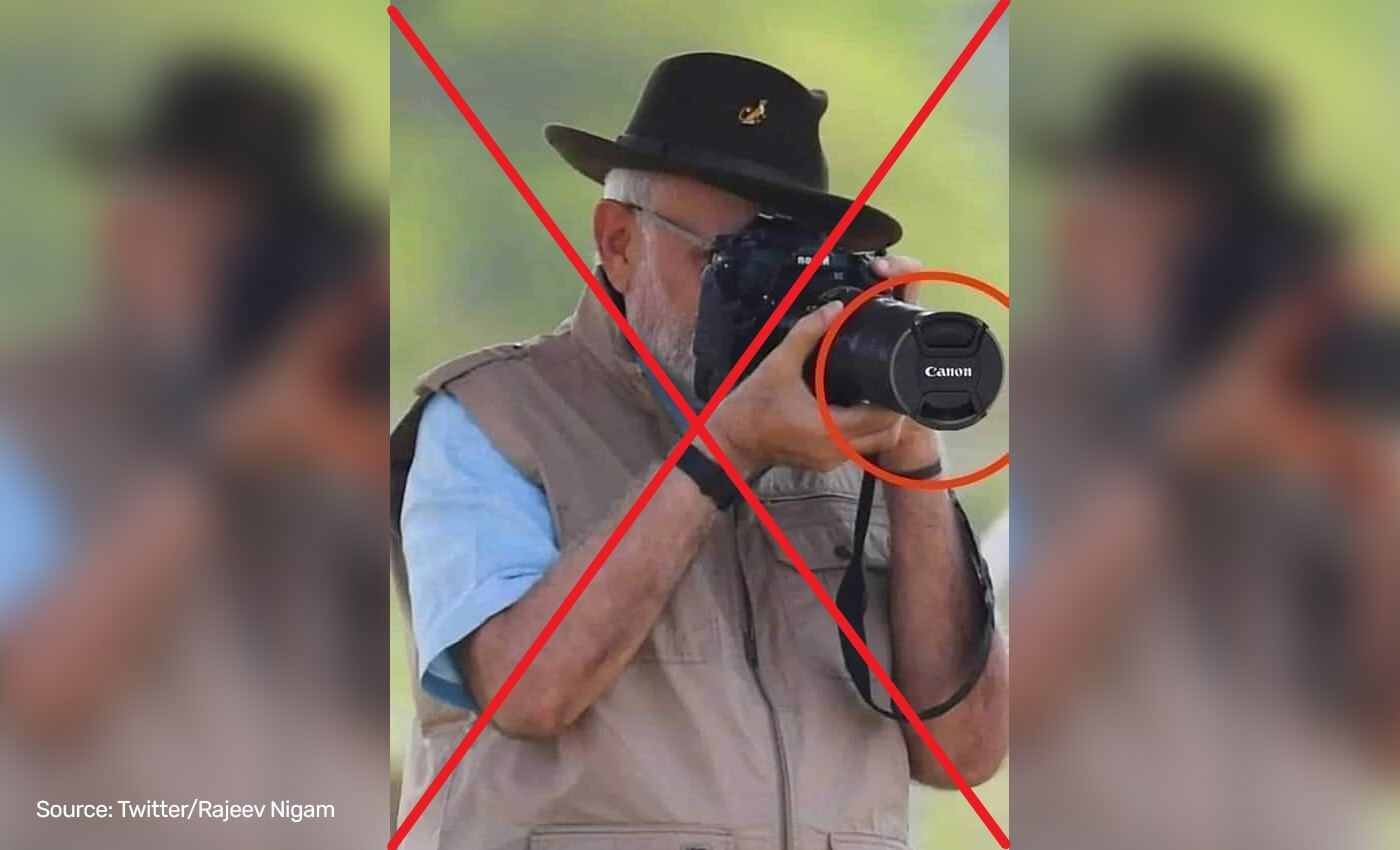 PM Narendra Modi tried to click a picture without removing the camera lens cap.