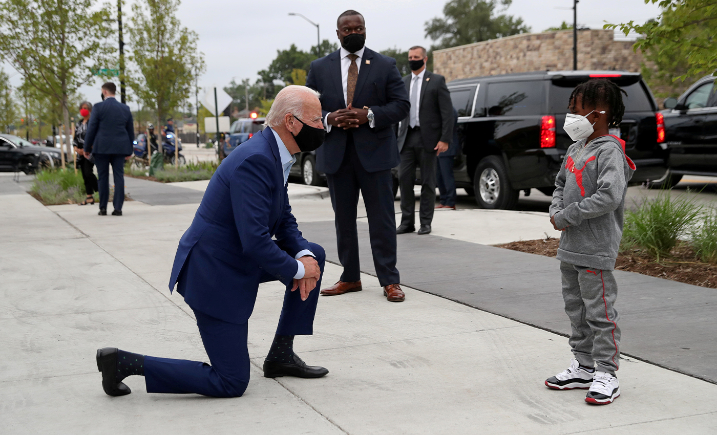 Joe Biden knelt in front of George Floyd's daughter and apologized to her.