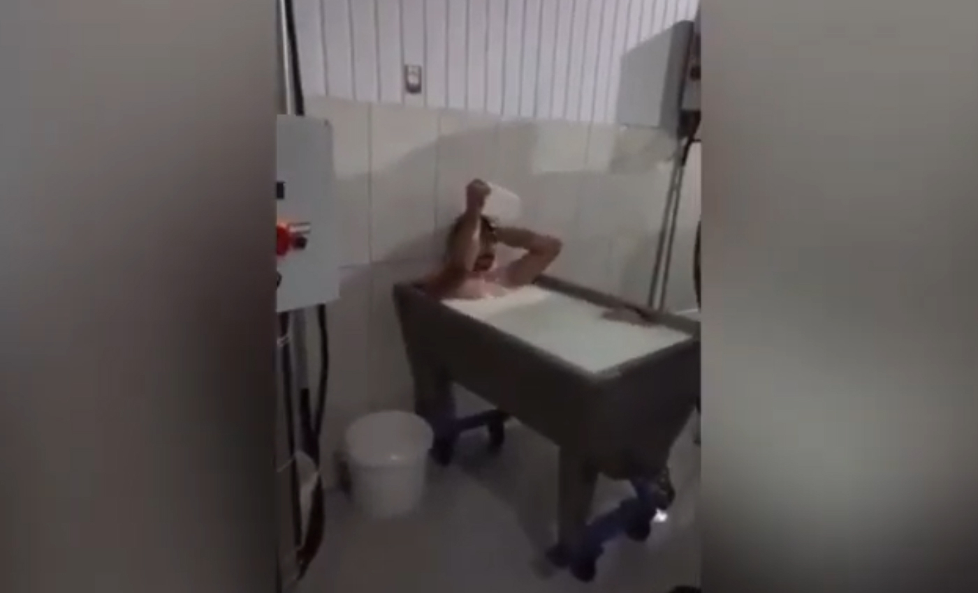 A video shows a man bathing in a metal tub filled with milk at Punjab's Verka dairy plant.