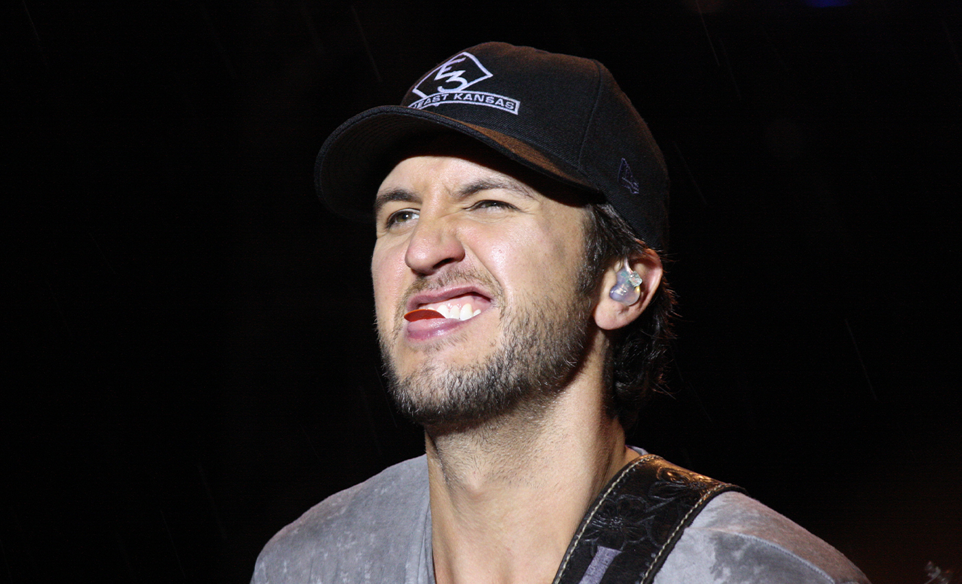 Luke Bryan opened one of country music's biggest nights by singing his song, 'Rain Is a Good Thing,' before throwing it to Luke Combs.