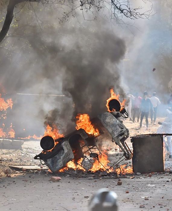 Amit Shah and Yogi Adityanath accused of fanning communal riots in Delhi.