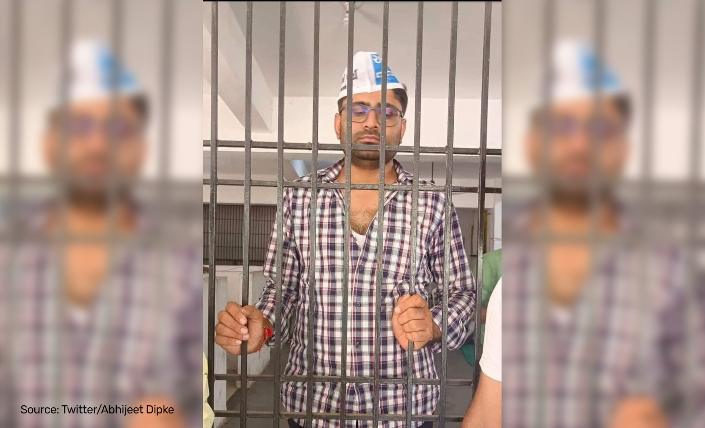 Image shows AAP leader Gopal Italia behind bars after Delhi Police arrested him for abusing Modi.