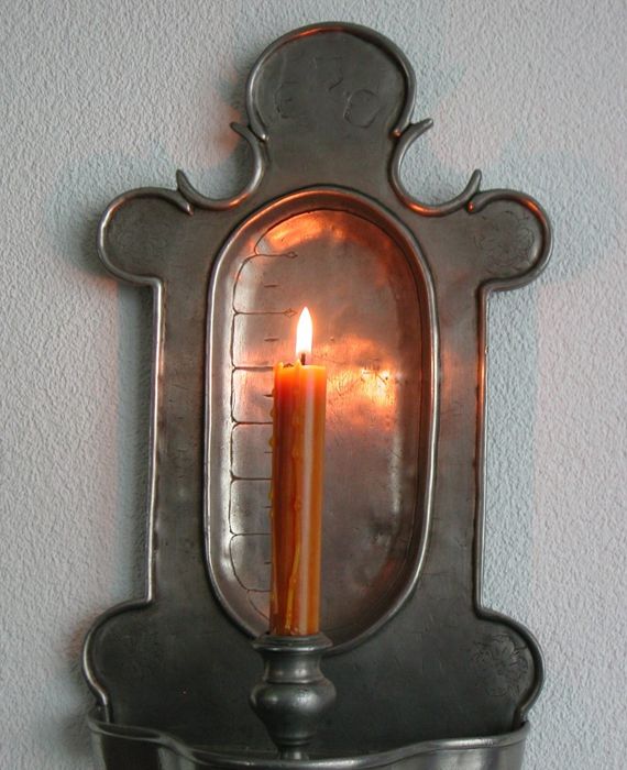 Candle clocks were used as an alarm by pushing a nail at the desired time length in the candle, and when it melts, the nail used to fall and clank on the metal as an alert.