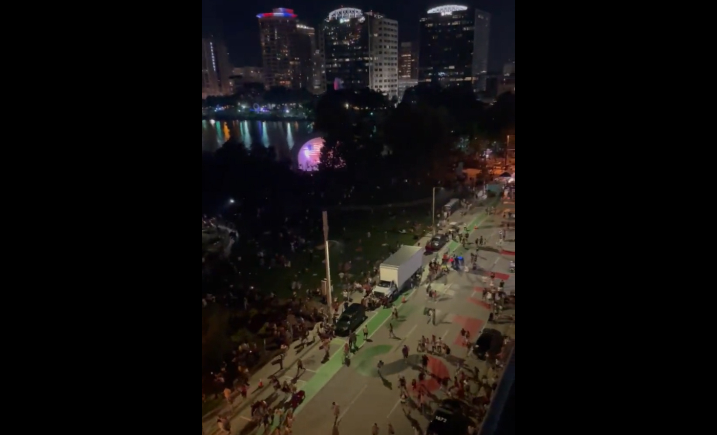 A video shows people running in fear after hearing gunshots at Lake Eola, Orlando.