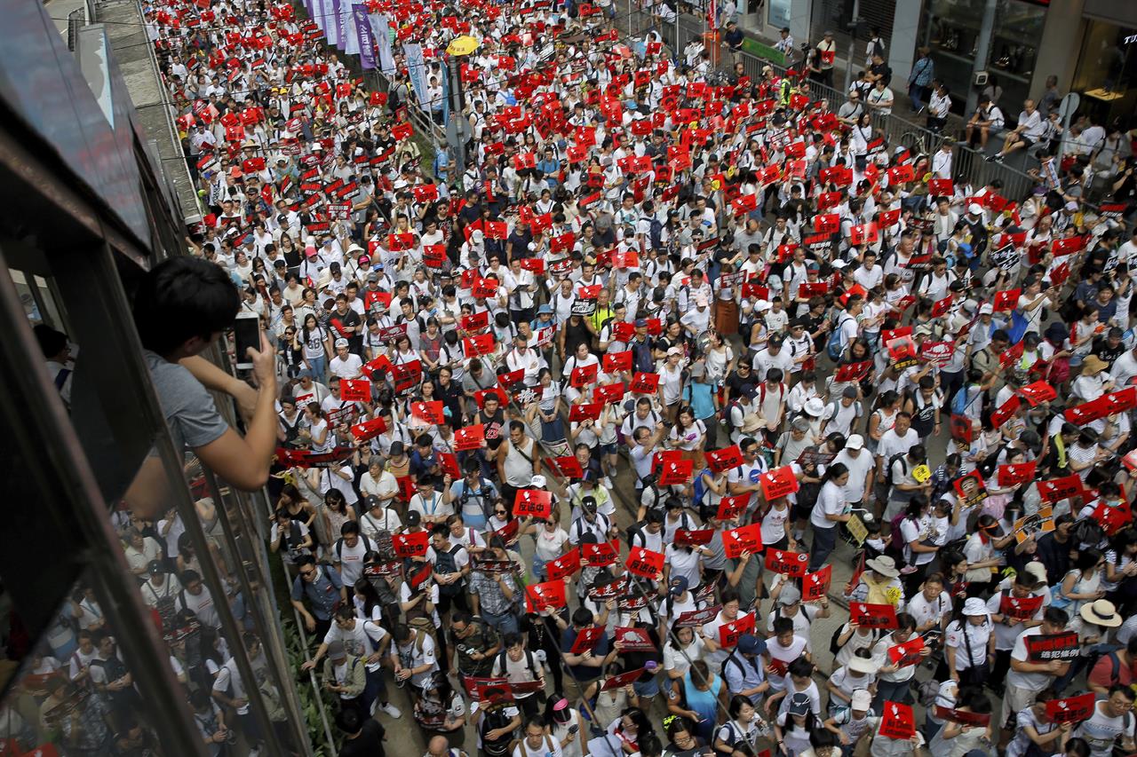 Hong Kong is hit by huge protests against a controversial Extradition Bill.